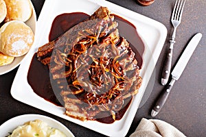 Sliced brisket with caramelized onions