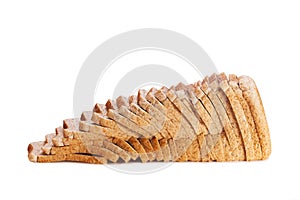 Sliced brown bread on wooden chopping board