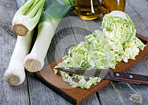 Sliced cabbage and shallots on a table