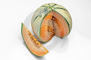 Sliced cantaloupe melon. Raw Organic Tuscan Melon Cantaloupe