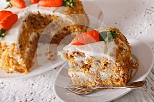 Sliced carrot cake on a plate closeup. horizontal