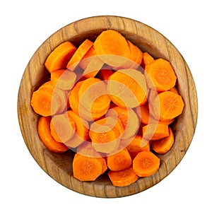 Sliced carrots in a bowl Isolated on white background. Fresh cut crisp pieces of  carrots, a root vegetable with orange color.