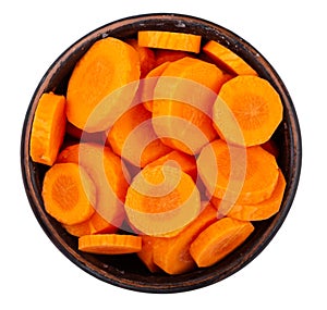 Sliced carrots in a bowl Isolated on white background. Fresh cut crisp pieces of  carrots, a root vegetable with orange color.