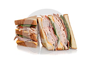 Sliced chicken club sandwich