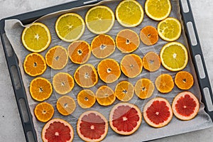 Sliced citrus on baking sheet