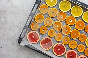 Sliced citrus on baking sheet