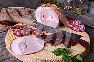 Sliced cold cuts and knife