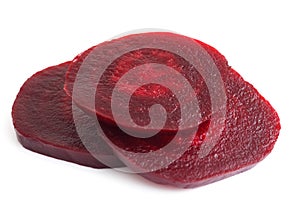 Sliced cooked beetroot isolated on white. photo