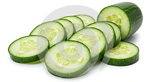 Sliced cucumber (Cucumis sativus) arranged on a flat surface. The cucumber is cut photo
