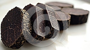Sliced dark root vegetables photo