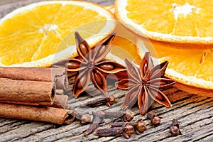 Sliced of dried orange with star anise clove and cinnamon sticks