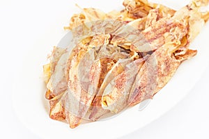 Sliced dry squid in isolate on white.