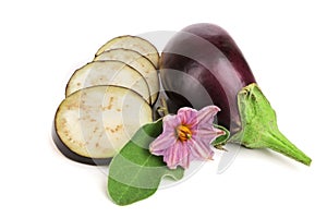 Sliced eggplant or aubergine vegetable with flower isolated on white background