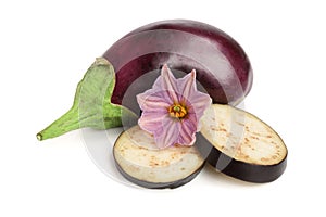 Sliced eggplant or aubergine vegetable with flower isolated on white background