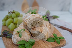 sliced french baguette with crumbs