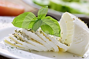 Sliced fresh cheese