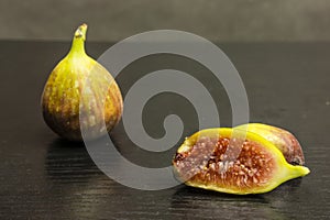 Sliced fresh fruit fig on the table.