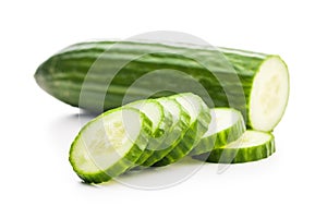 Sliced fresh green cucumber isolated on white background