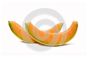 Sliced fresh melon fruit isolated on white