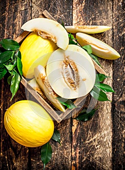 Sliced fresh melon in the old box.