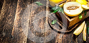 Sliced fresh melon in the old box.