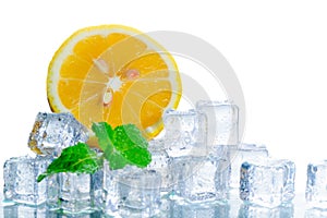 Sliced fresh orange in ice cube and mint leaf