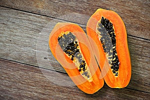 Sliced fresh papaya on wooden