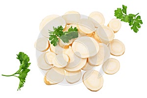 sliced fresh parsley root with parsley isolated on white background. top view