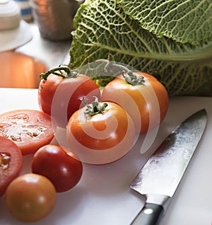 Sliced fresh tomatoes on a cutting board