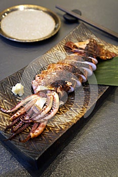 Sliced fried squid on plate