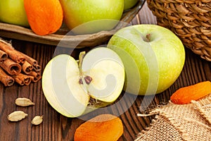 sliced granny smith apple on wood