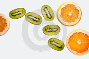 Sliced grapefruit half isolated on black background., copy space