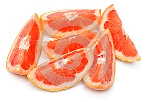 Sliced grapefruit isolated on white