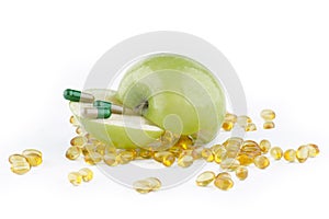 SLICED GREEN APPLE WITH CAPSULES