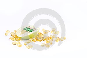 SLICED GREEN APPLE WITH CAPSULES