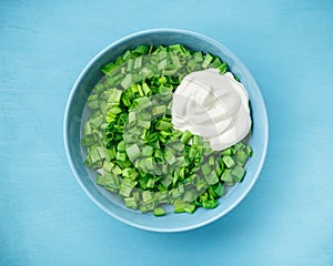 Sliced green onions or scallions in a bowl