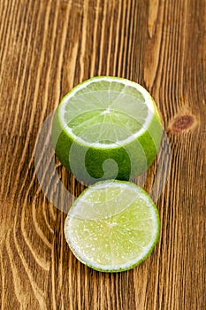 sliced green ripe lime on a board