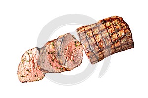 Sliced grilled beef tenderloin seasoned with salt, rosemary and thyme on white background