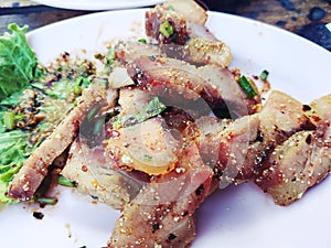 Sliced grilled pork salad spicy Thai style