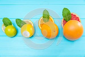 Sliced halved assorted fresh citrus fruit