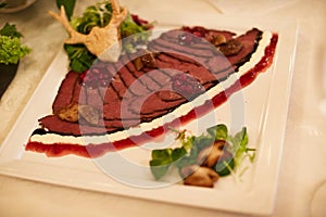 Sliced ham with lettuce, shallow depth, selective focus