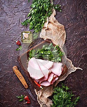 Sliced ham with spices.