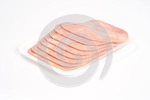 Sliced ham on tray