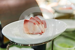 Sliced Hamachi Fish Sashimi with Sliced Radish