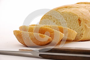 Sliced jaco sourdough bread loaf with knife photo