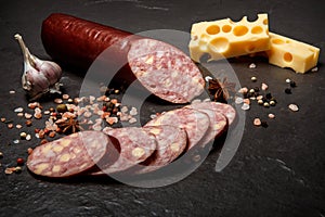 Sliced jalapeno cheddar summer sausage with cheese and garlic