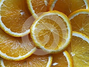 Sliced juicy oranges close-up.