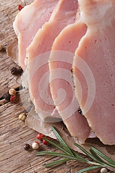 Sliced juicy roast pork meat. vertical