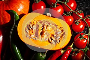 sliced kuri squash on black