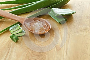 sliced and leaf of fresh aloe vera with aloe vera gel product on